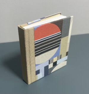 small book with Bauhaus style paper