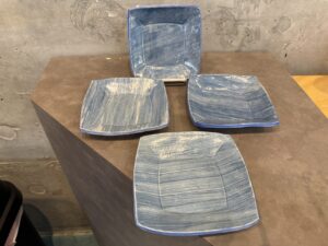 set of 4 blue striped dishes